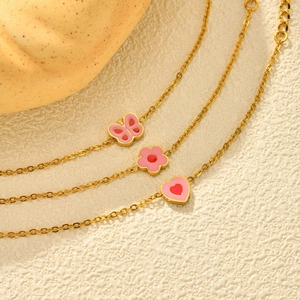 Set di cavigliere dorate per bambine con farfalla e cuore in smalto rosa dolce