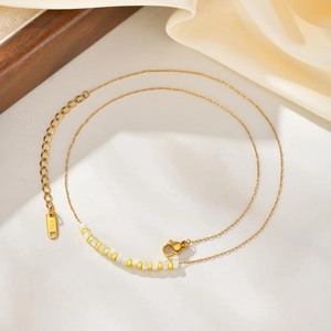 Elegant 18K gold-plated stainless steel chain necklace with white shell beads and squares