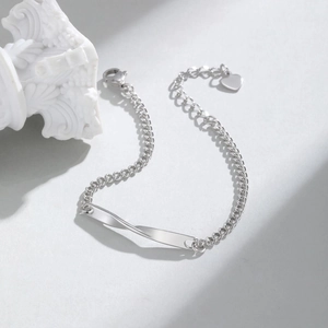 Bracelet Mobius en acier inoxydable poli avec chaîne gourmette et breloque cœur