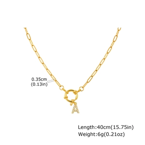 Close-up of 18K gold-plated paperclip chain with crystal A-letter pendant and spring clasp