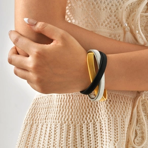 Bracciale elastico a maglia da donna in finiture oro, argento e nero opaco