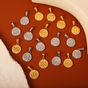 Macro view of round angel number pendants with embossed digits and sparkling zircon accents