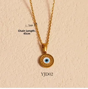 Detail of 24k gold plated evil eye pendant with 45cm chain length and 1.5mm width