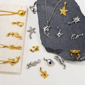 Zeeleven hangers met dolfijnen en schildpadden in 24k goud en zilveren afwerkingen