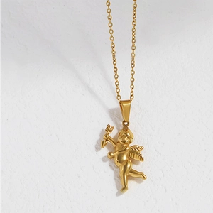 Close-up of golden Cupid angel pendant with wings and bow in matte 18K finish
