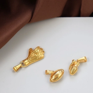 Detailed close-up of 24K gold-plated boxing glove, rugby, and grenade steel pendants