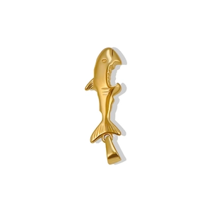 Macro detail of 24K gold-plated stainless steel shark pendant with polished finish