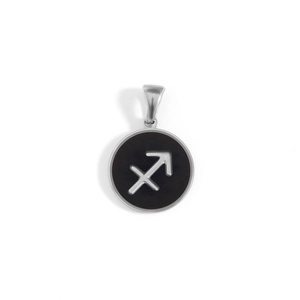 Macro shot of silver stainless steel Sagittarius zodiac charm with a black enamel finish