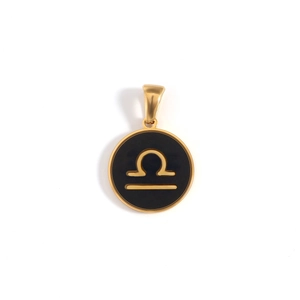 Detail view of 18k gold Libra zodiac pendant with black enamel finish and gold symbols