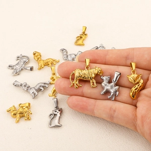 DIY 24k gold and silver animal pendants in stainless steel featuring tigers and foxes