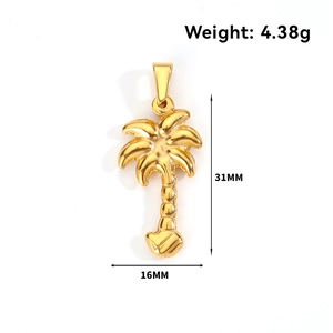 Detailed golden palm tree pendant with leaf veins and dimensions 31mm by 16mm