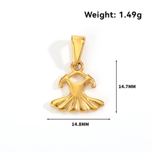Macro detail of a 24k gold-plated ballet dress pendant with weight and size dimensions