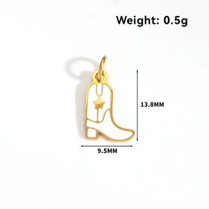 Detail of golden stainless steel cowboy boot charm with white enamel and star inlay