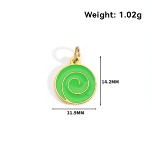 Detailed view of round gold stainless steel charm with green enamel and 14.2mm dimensions