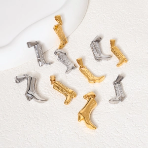 Western cowboy boot pendants in gold and silver steel with detailed totem engravings