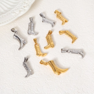 Cowboy boot pendants in gold and silver finish with detailed western embossed texture