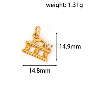 Detail of 24k gold plated Libra zodiac pendant with dimensions 14.9mm and 1.31g weight