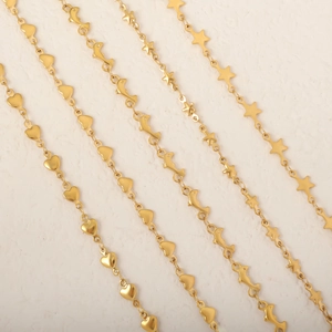 Gold plated stainless steel chain necklace with heart, dolphin and star charms