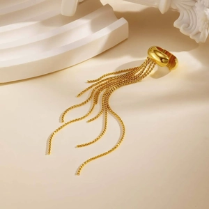 Elegant gold stainless steel ear cuff with long layered tassel chains on stone pillar