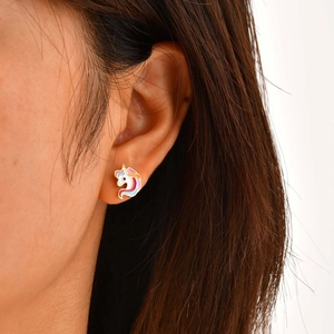 Cute colorful unicorn stud earrings for kids with gold finish and enamel detail on ear