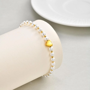 Bracelet élégant en acier inoxydable avec pendentif cœur, perles blanches et dorées