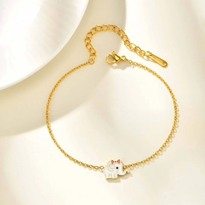 Gouden roestvrijstalen armband met een schattige witte olifant hanger en roze strik