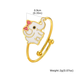 Close-up of golden elephant ring with white enamel detail and 0.9cm width dimension