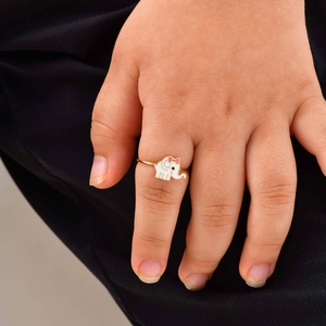 Cute children's adjustable gold ring with white elephant and pink bow design