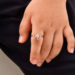 Detail of colorful enamel unicorn on 18K gold-plated stainless steel child ring