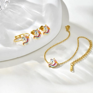 Golden unicorn jewelry set for girls with adjustable ring, bracelet, and stud earrings
