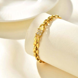 18K gold plated stainless steel watch-style bracelet with sparkling white zircon flowers