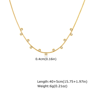 Detail view of gold snake chain necklace with round zircon pendants and size specifications