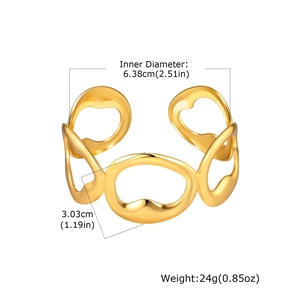 Detail shot showing 6.38cm inner diameter and 3.03cm width of the gold cutout cuff
