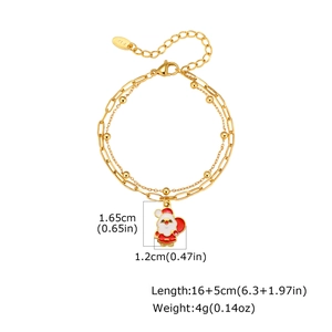 Detail of double-layer gold stainless steel bracelet with Santa charm and 18K engraving