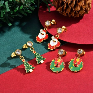 Gold Christmas earrings set with Santa, tree and wreath designs and sparkling crystals