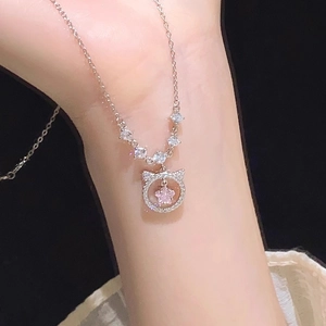 S925 silver necklace with pink star cat pendant on model for elegant styling
