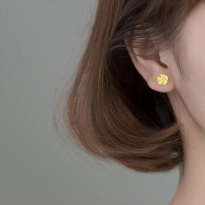 Elegant S925 silver stud earrings featuring yellow five-petal flowers and zircon centers