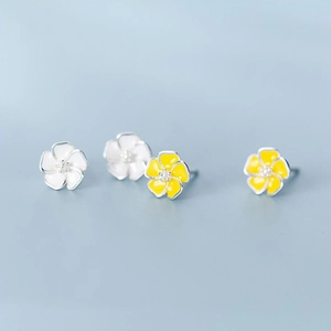 S925 silver flower stud earrings in white and yellow enamel shown from a front angle