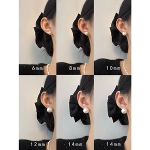 Comparación de pendientes de perlas de 6mm a 14mm mostrando un brillo elegante