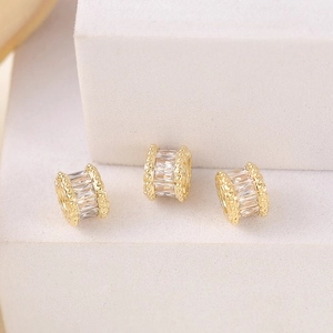 Trois perles d'espacement cylindriques dorées avec zircones pour la création de bijoux DIY