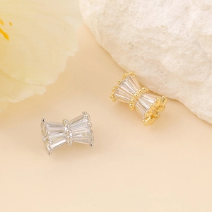 Elegant zircon encrusted bow-tie spacer beads in gold and silver for DIY jewelry