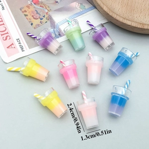 Macro detail of 2.4cm mini resin bubble tea charms in assorted macaron pastel colors