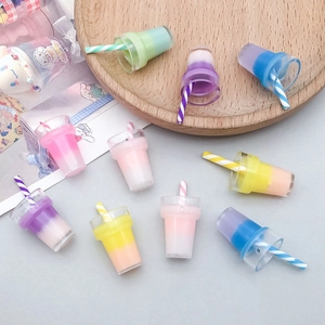 Detailed view of colorful miniature resin bubble tea charms for DIY jewelry and crafts