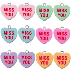 Set of 12 colorful heart-shaped resin charms with MISS YOU lettering for DIY jewelry