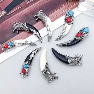 Tribal wolf tooth pendants in vintage Tibetan silver with inlaid colorful beads