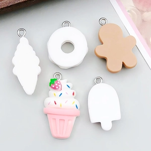 Detailed view of DIY resin charms including ice cream, donut and cupcake shapes