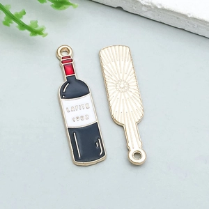 Detailed macro view of the alloy wine bottle pendant with Lafite 1982 enamel design