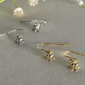 Elegant lily of the valley earrings in gold and silver finish with flower hooks