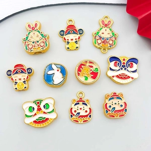 Set of 10 colorful Chinese style enamel charms including God of Wealth and Lion Dance