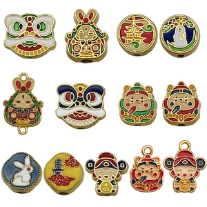 Colorful enameled Chinese traditional charms with lions, rabbits and God of Wealth motifs